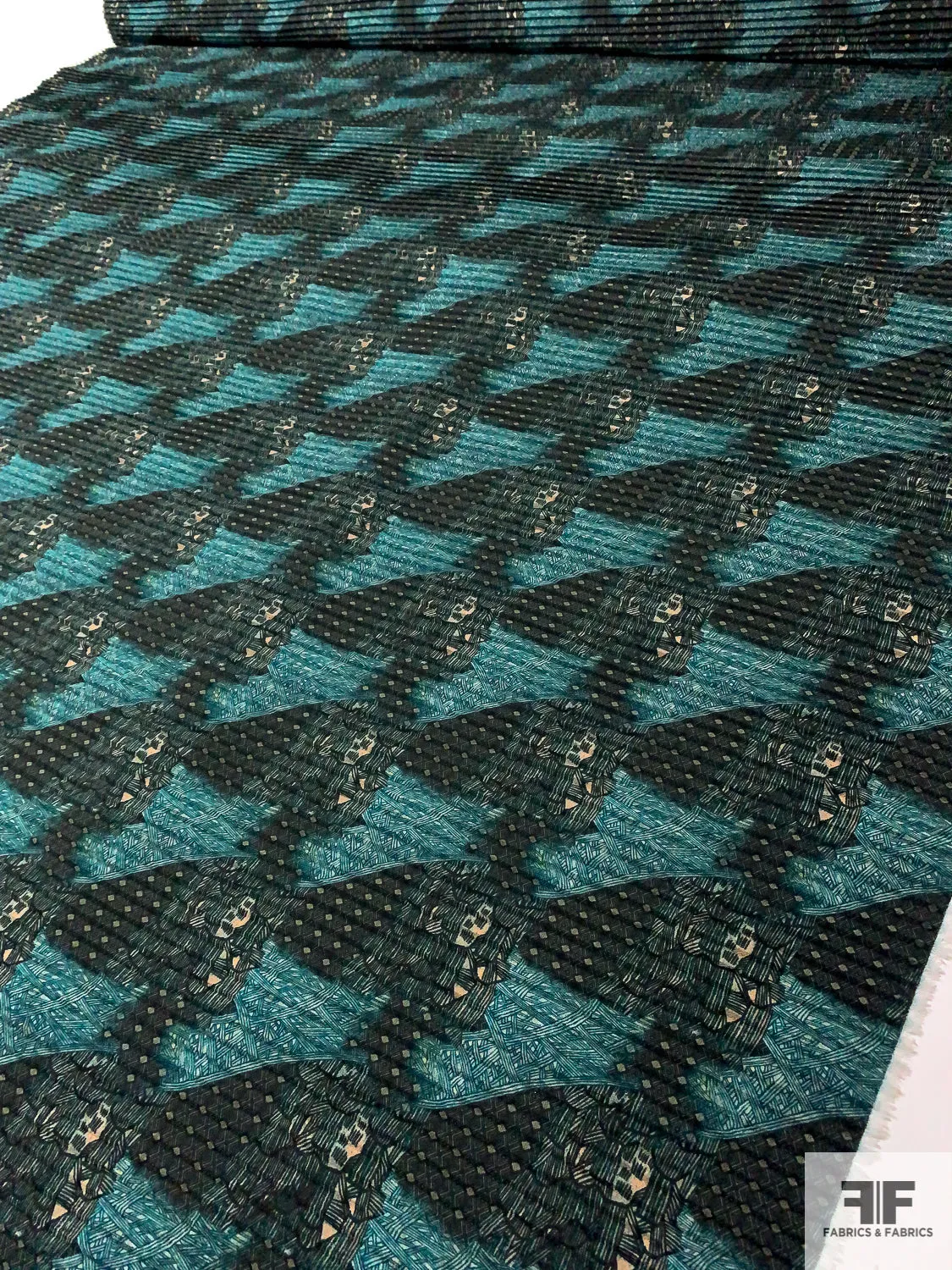Abstract Printed Pleated Polyester Georgette - Shades of Teal / Blush